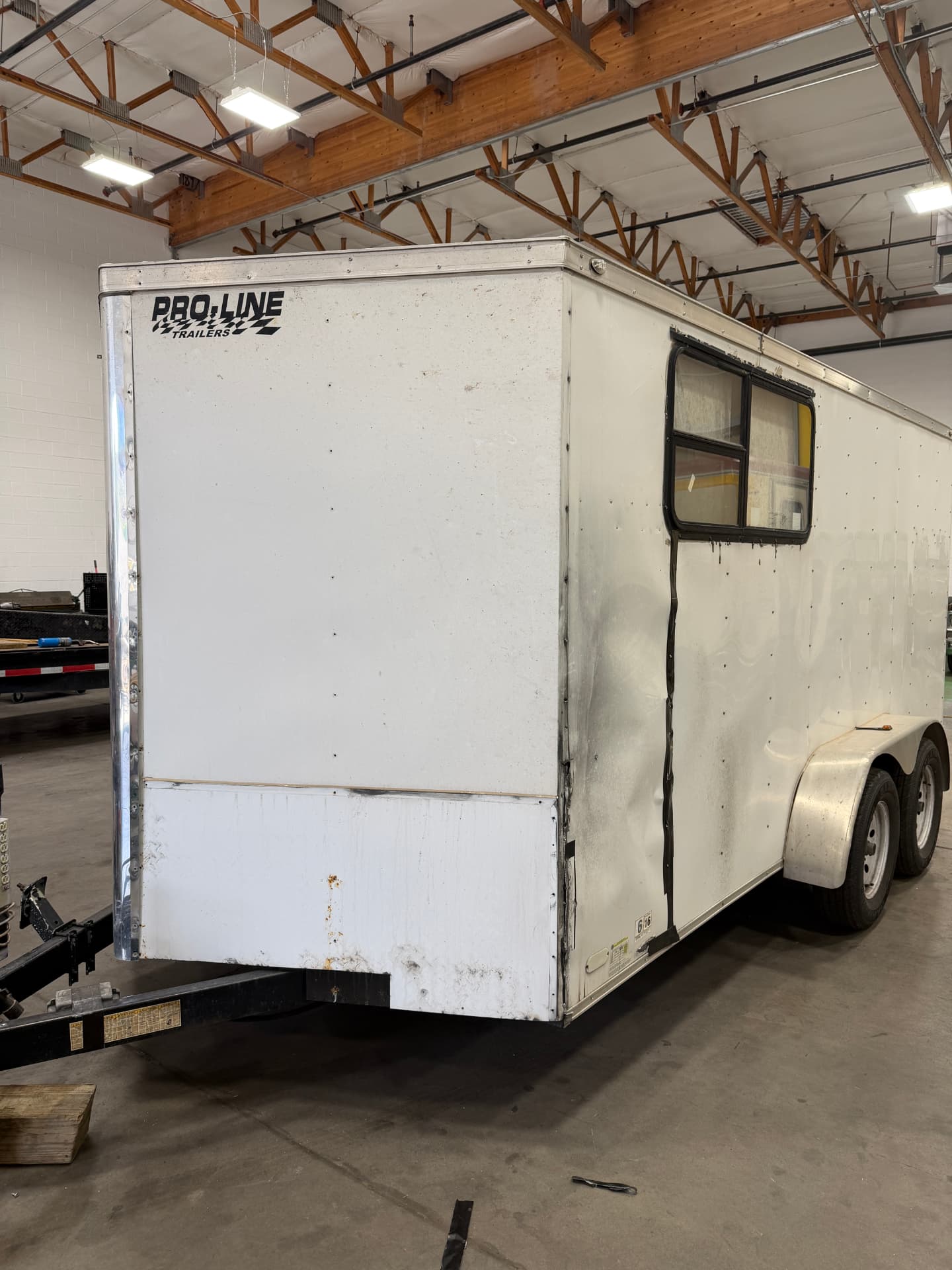 Enclosed trailer side wall panel replacement — before and after — before