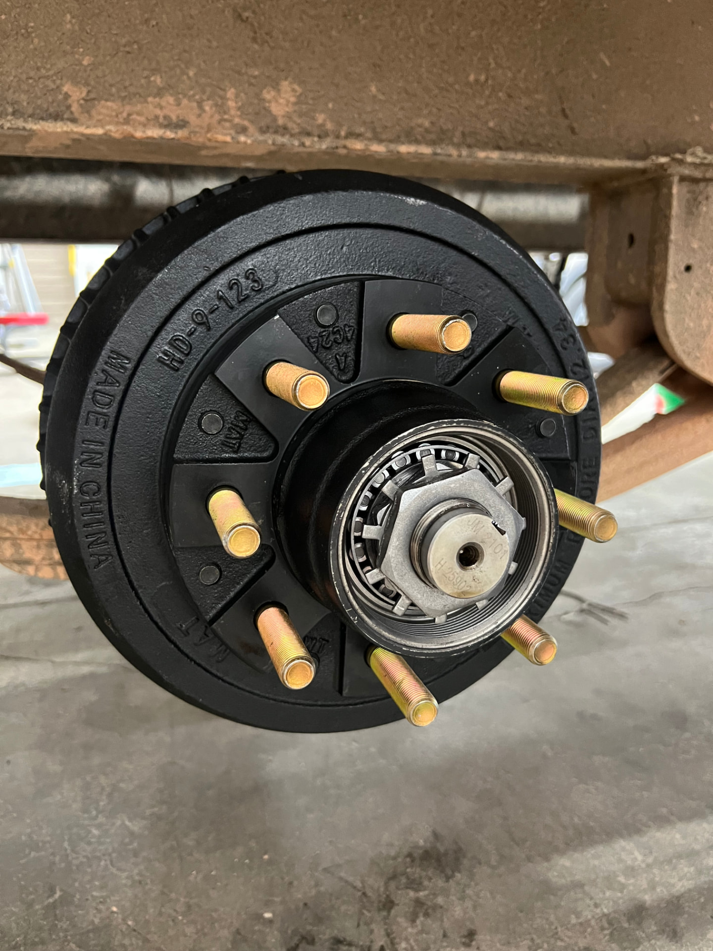 Trailer hub and drum with new bearing and spindle nut installed