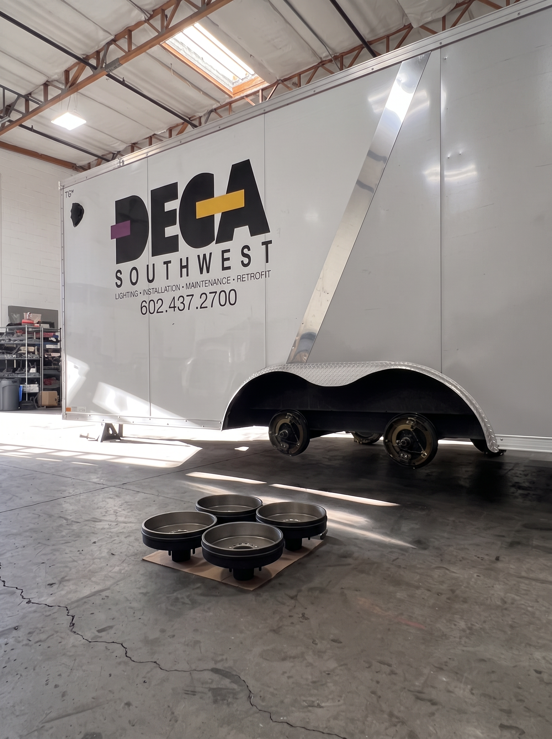 DECA Southwest enclosed trailer with new brake assemblies installed and drums ready in the SPARKS shop