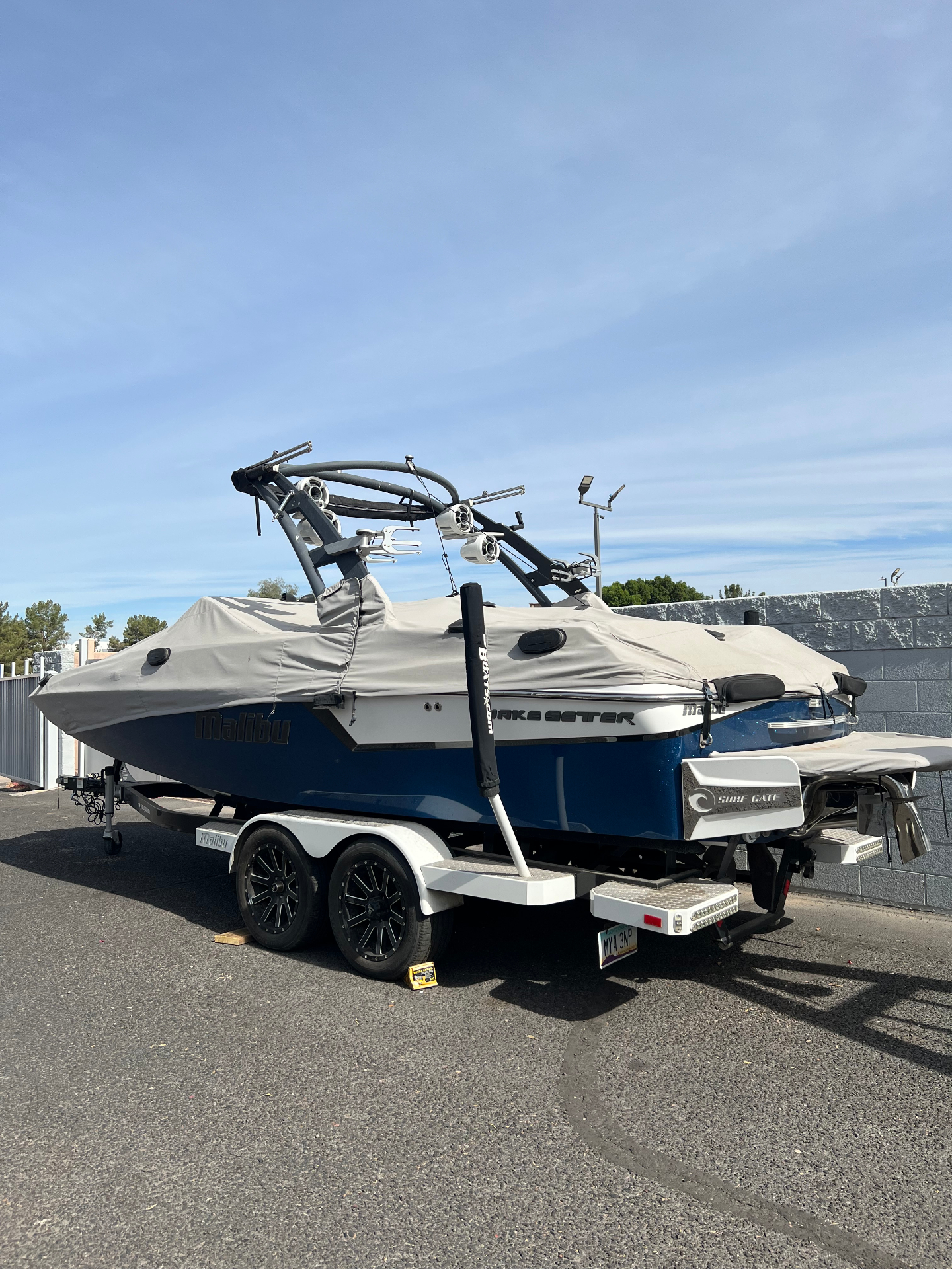 Malibu Wakesetter on tandem trailer ready after maintenance